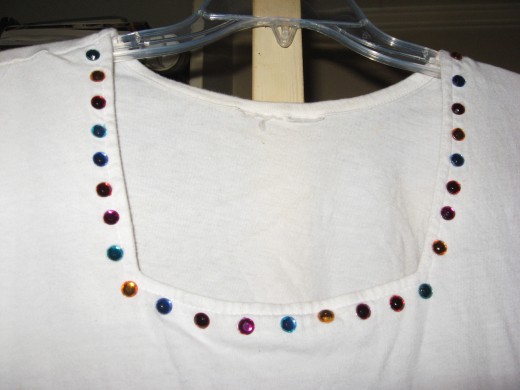 Add bling to cheap clothing with stones.