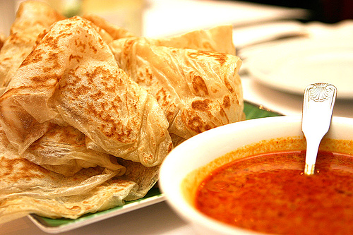The flakier cousin of Naan, roti prata is often eaten as a breakfast food in Singapore. 
