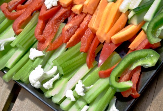 A crudite platter, with ranch dressing dip or hummus, set out before dinner as an appetizer is a great way to get kids to try new veggies!