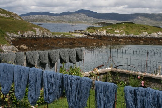 Yarn drying outside weaver's workshop on Harris.  The colours of the land and sea are fixed in the wool from the sheep that graze the hillsides, making the tweed as unique and gorgeous as the islands that produce it.