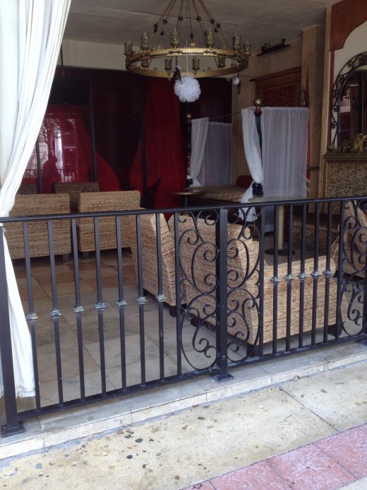 The Turkish sidewalk cafe offers comfort and privacy as you sip a cup of coffee. 