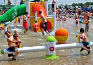 Kids in the water spray area - White water mountain water park
