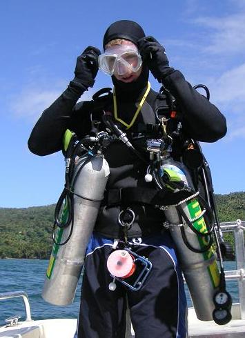 Technical Diver with side mounted tanks.