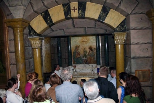 A crush of visitors look at the recreation of the Chapel of the Annunciation in Nazareth.