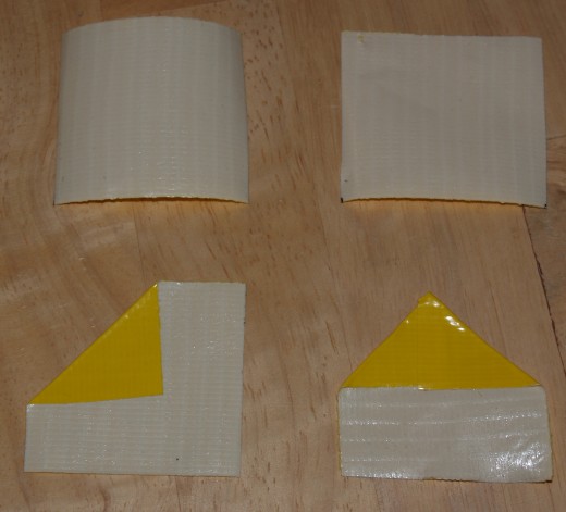 Tape pieces sticky side up. The bottom left image shows one top corner folded down to the center of a piece of tape. The bottom right image shows the corresponding top corner folded down to the center of the tape.