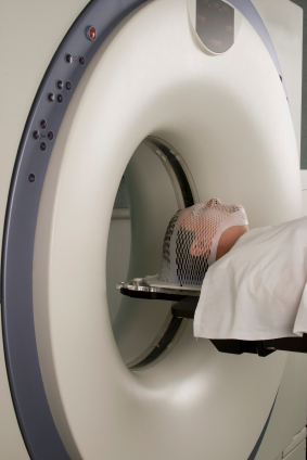 A CT scan shows the brain slice by slice.  It allows medical personnel to see deep into the brain tissue to determine if brain tissue has been damaged or lost.