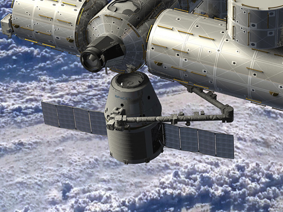 Artist rendering of SpaceX Dragon spacecraft docking at the International Space Station.