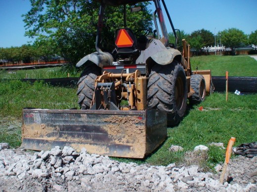 Combination bulldozer and front-end loader.