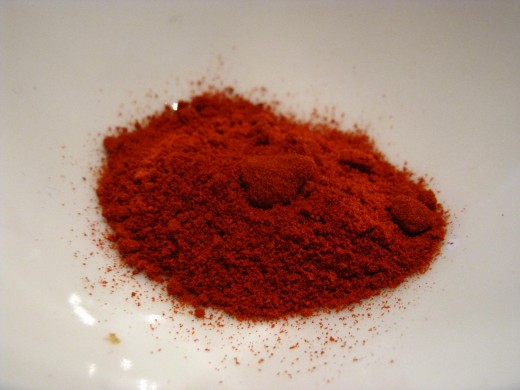 Color is a good indicator of freshness and potency.  If paprika has turned brown or herbs are grey, they've probably lost flavor as well.
