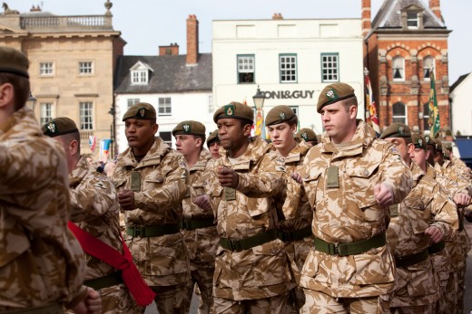 Soldiers On Parade Through Town