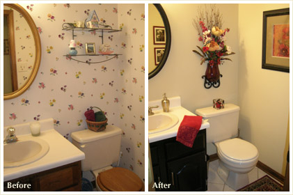 Removing the fussy wallpaper and just adding a splash of red makes this bathroom more appealing. The mirror boarder was painted black to contrast wit the white walls.
