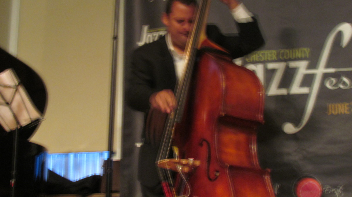 Matthew Parrish, gets down on the bass.