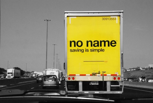 His truck says No Name but rolls on in fame;  yellow bright and sunny, in a slow moving highway it brings a smile to many.