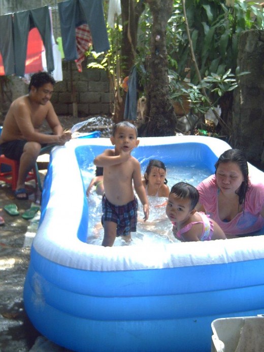 Effective Parenting via social development should begin at home courtesy of Paradela and Briones Families of Calabanga, Camarines Sur, Philippines (Photo by Travel Man)