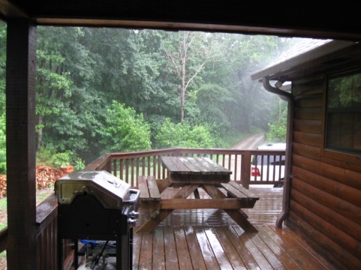 Even if it's raining you can sit in the hot tub (photo taken from hot tub) and enjoy the view from the protection of the covered deck.