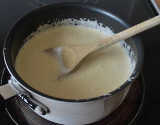Heat the heavy cream in a saucepan.   Remove from the heat just before it begins to boil.