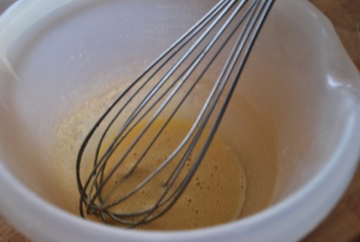 In a separate bowl, whisk the egg whites and sugar together until it is light and fluffy.