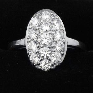 An imitation Twilight engagement ring-- Many tiny diamonds for far less than the price of one larger stone.
