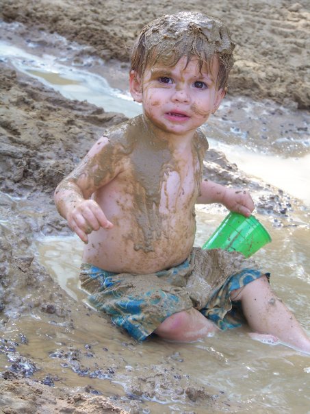 Who would think this mud-ladened toddler could offer such sweet kisses and hugs?  Look past the dirt, and you'll find a loving, bright little boy.