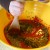 Stirring the sauce ingredients. Stirring the sauce ingredients.
