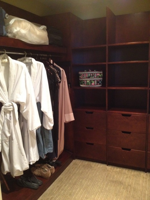 The master closet provided lots of storage and fluffy robes. 