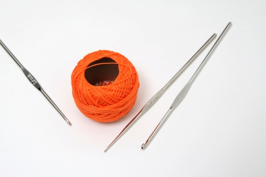 ORANGE SKEIN by Portulaca  An orange skein of cotton thread