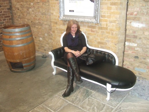 Wait for the wine tour on a chaise lounge.