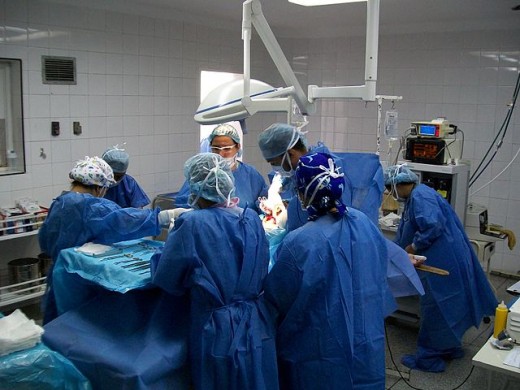 A cesarean section being performed in the operating room. Assistance of a doula during childbirth has been shown to significantly reduce the rate of cesarean births.