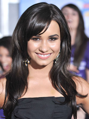 Demi Lovato in Black Hair. She definitely looks like an Italian or Mexican girl here.