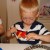 He concentrates very hard on his cooking! He concentrates very hard on his cooking!