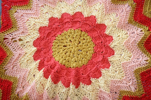 CROCHETED SUNFLOWER by Jprescott  DESCRIPTIONDetail of sunflower made from crochet on the front of a tank top