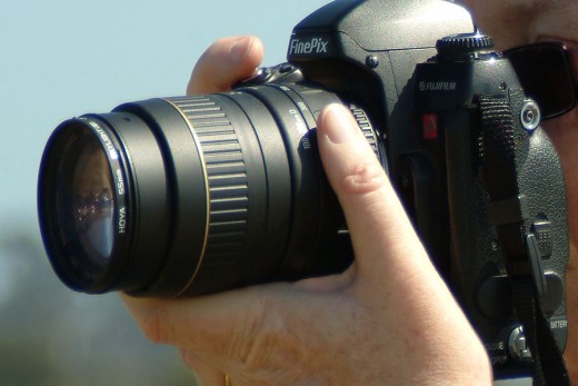 Finding just the right digital photographer or a family member who's in the photo business can save a ton of money! Ask if they will just give you a CD so you can print the images yourself! 