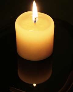 A candle lit in respect