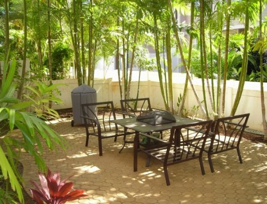 Something tells me when they designed a fire pit in the center of this table, they didn't have cremation in mind!
