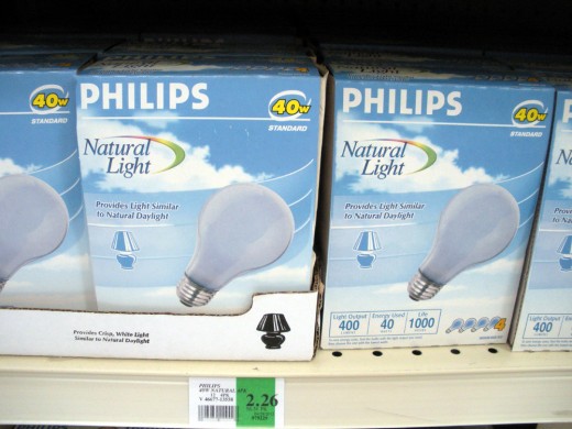Standard 40 Watt bulbs, clearly marked at--well look at that:  $2.26 per 4-pack--the same as the lower wattage.