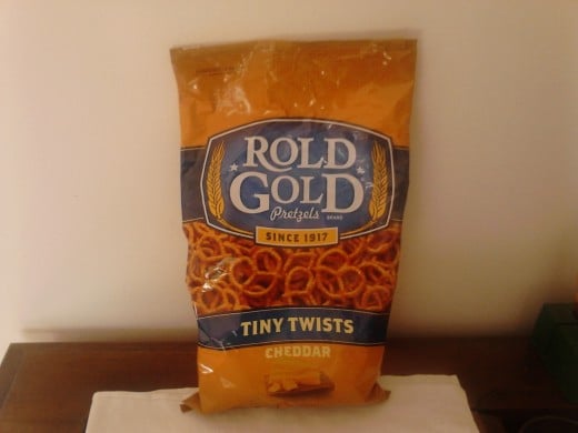 My half eaten bag of Rold Gold Tiny Twists Cheddar Pretzels