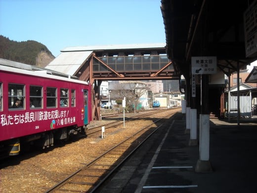 A train departing from Gujo Hachiman Station.