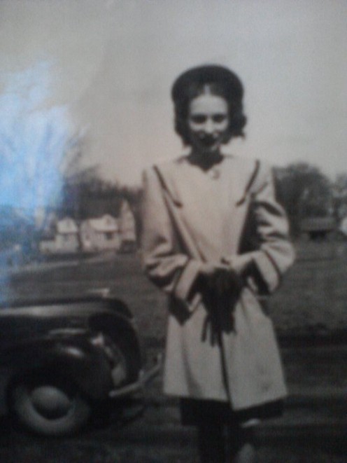 A photo of my mother when she was young in Elma, Iowa. The photo is very old.