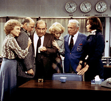 Group hug in the newsroom in the final scene of the Mary Tyler Moore Show