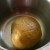 Place the kneaded dough ball in a lightly oiled bowl. Turn the dough so that the dough ball is covered in the oil (this prevents the covering towel from sticking to the dough ball). 