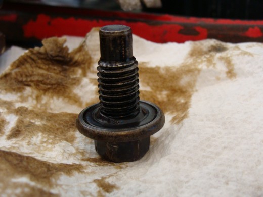 Clean the drain plug and and check for damaged threads.