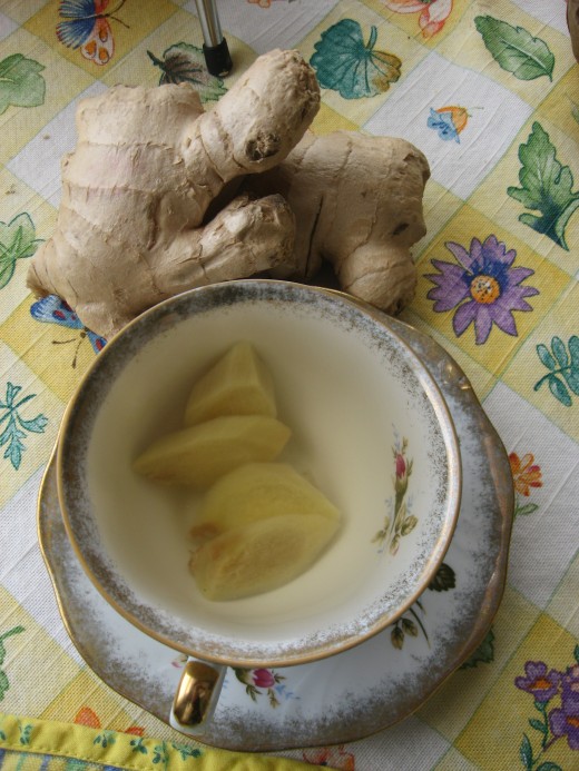 A dainty cup of freshly-brewed ginger tea.