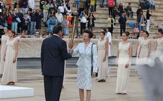 Princess Anne Accepts the Olympic Flame in Athens, which will make then its journey through England starting in Cornwall.