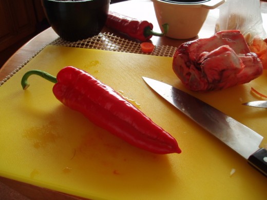 Red pepper with piece of shin bone