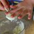 Add 2 tablespoons chopped onion, 1/4 cup butter, and 1/4 cup water to the bread crumbs. Add 2 tablespoons chopped onion, 1/4 cup butter, and 1/4 cup water to the bread crumbs.