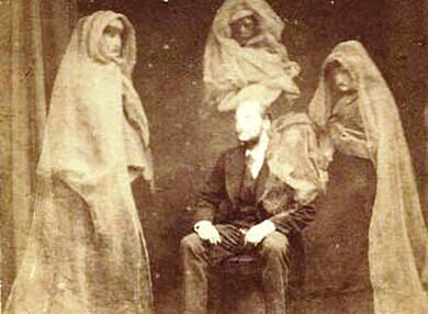 Hudson (1875): Mr. Raby with the Spirits "Countess," "James Lombard," "Tommy," and the Spirit of Mr. Wootton's Mother.