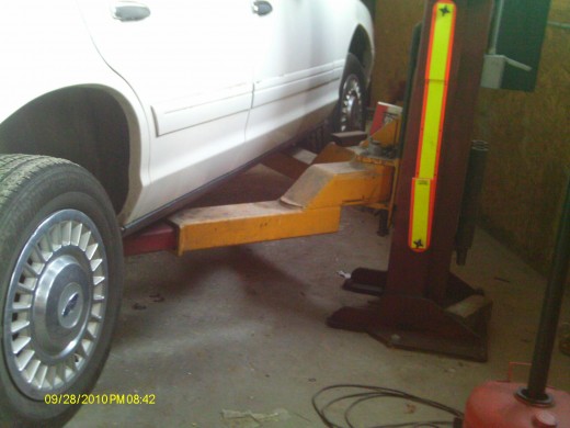 When the floor jack lifts the car stay safe by using jack stands to keep it from falling down.