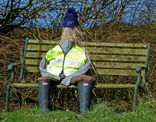this is a lovely example of true American design ingenuity, the making of  this scarecrow "on break."