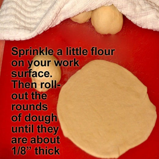 Lightly flour your work surface, and roll out the balls into 1/8" thick rounds.