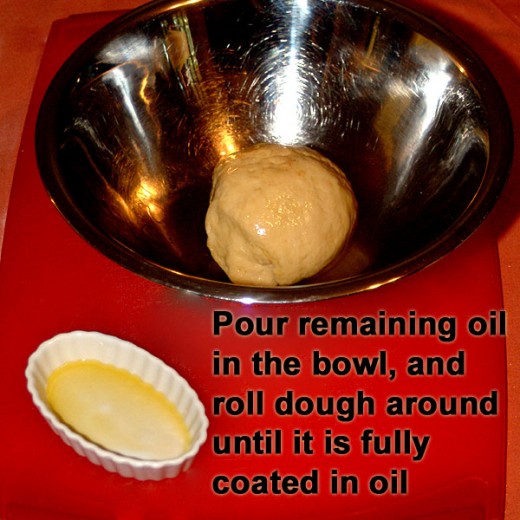 Add the remaining olive oil to bowl to coat dough.